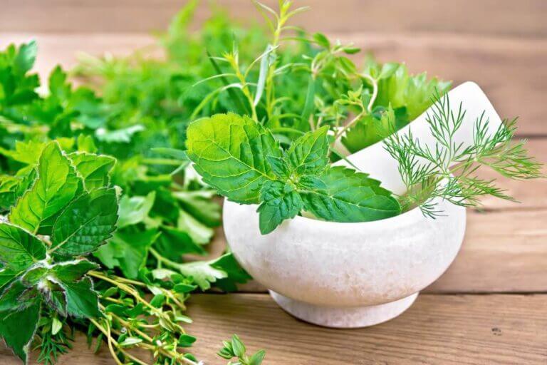 Herb leaves in a stone bowl